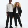 Pantalones de chándal TNF™ Performance Fleece para niño y niña Pantalones de chándal TNF™ Performance Fleece para niño y niña