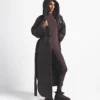 Parka envolvente Nuptse para mujer de The North Face X SKIMS Parka envolvente Nuptse para mujer de The North Face X SKIMS